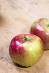 tasty apples on a wooden background
