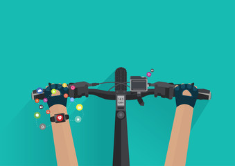 Fototapeta premium Hands riding a bike with wearing a smartwatch heart rate monitor