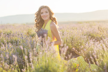 Pregnant woman in a lavender field
