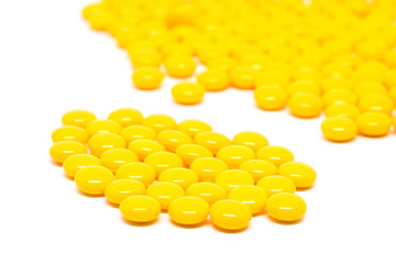 yellow sugar coated tablets pills