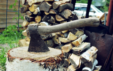 Old axe on the stump