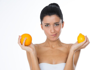 girl holding citrus