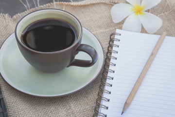 black coffee and Paper note book