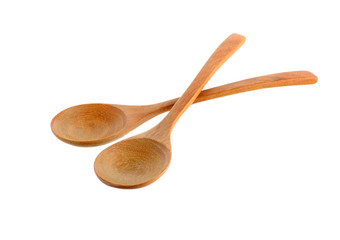 Wooden spoons on white background