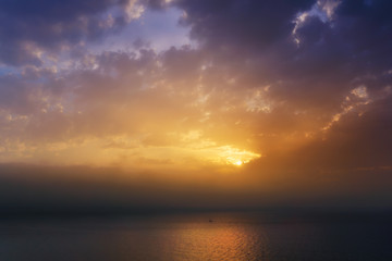 Fototapeta na wymiar golden sunset over sea