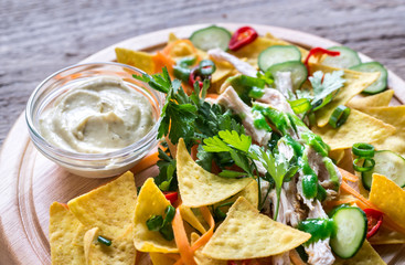Nachos with chicken and vegetables