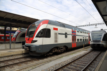 Fototapeta premium Railway station with high-speed passenger train