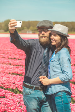 Happy loving tourists taking selfie