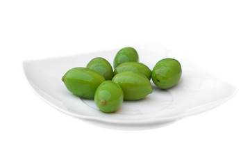 Green olives on a plate
