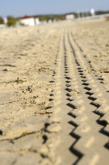 Tire tracks in the sand