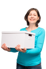 beautiful brunette holding a white cardboard box on a white back