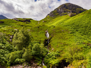 Glencoe waterfalls after heavy rainfall earlier, Glencoe, Highlands of Scotland, Scotland, UK