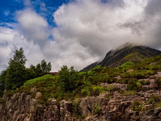 Fototapeta na wymiar Glencoe waterfalls after heavy rainfall earlier, Glencoe, Highlands of Scotland, Scotland, UK