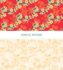 a set of two cherry flowers seamless tiles in red, blue and ivory shades