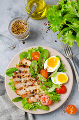 Chicken salad with leaf vegetables and cherry tomatoes