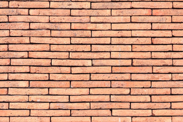 Orange brick wall texture. Grunge retro vintage of brick wall background for design with copy space for text or image.