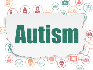 Health concept: Autism on Torn Paper background