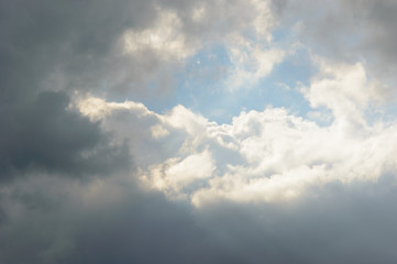 Fototapeta premium Bright sun reflected on clouds in sky
