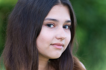 Portrait of girl with blue lenses in eyes