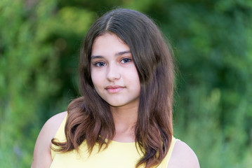 Naklejka premium Portrait of girl with blue lenses in eyes