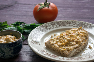 Toast with hummus. Traditional mediterranean food. Pea cream