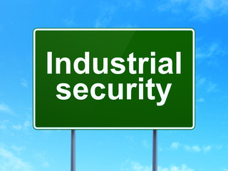 Security concept: Industrial Security on road sign background