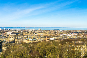 Fototapeta premium Edinburgh Cityscape from Calton Hill blue sky Scotland UK