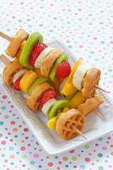 Fruit skewers on a dish
