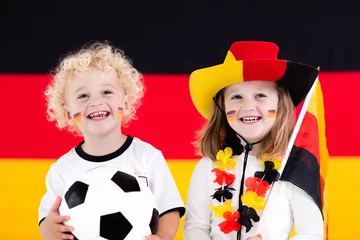 Foto op Plexiglas Happy kids, German football supporters © famveldman