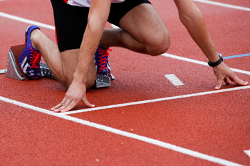 Sprinter leaving starting blocks