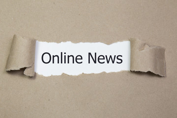 Torn paper with word Online News