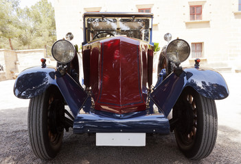 Vintage wedding car outdoors © Photojope
