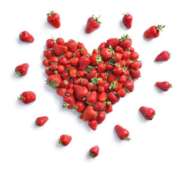 Heart symbol from strawberry isolated on white background. Fruits diet concept. Top view, High resolution product.