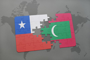 puzzle with the national flag of chile and maldives on a world map background.