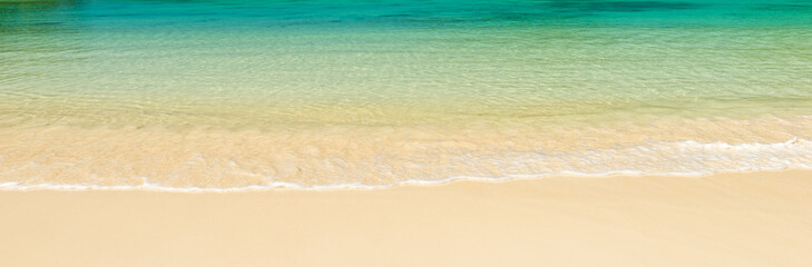 Fototapeta na wymiar Panorama of wave of the sea on the sand beach