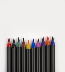 Brush pens on white background