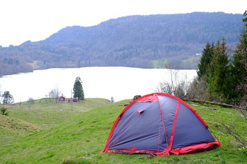 Tent on mountain lake