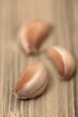 Fresh garlic on wooden table, selective focus