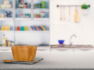 kitchenware on granite counter with kitchen blurred background