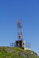Old cellular  communications antennas in the top of the mountains