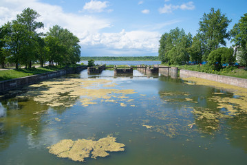 View of the ruins of an ancient gateway at the entrance to the old Ladoga canal, sunny june day Shlisselburg, Leningrad region, Russia