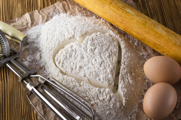 Eggs, a Hand Mixer and Flour.