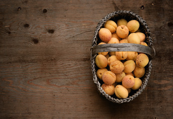 Full basket with ripe apricots