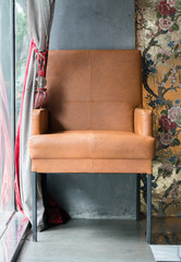 chair near a large window
