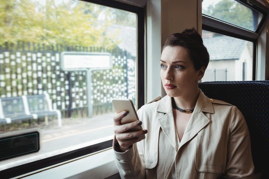 Woman sitting in train