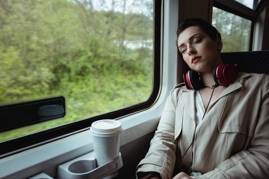 Young Woman Sleeping In Train