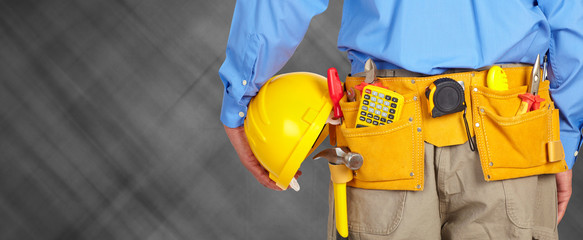 Fototapeta premium Construction worker with a tool belt.