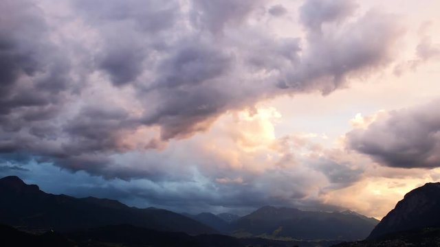 Timelapse of sky with clouds and lights - Innsbruck, Austria
