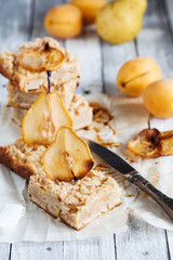 Close-up of pear pie with saffron and apricots