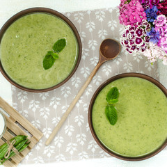 Vegetarian fresh pea cream soup, still life